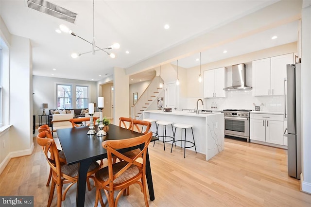 512 Peabody St NW, Washington, DC 20011 - dining space with light wood-style floors, recessed lighting, visible vents, and stairway