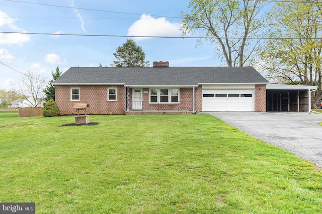 ranch-style home with a chimney, an attached garage, a front lawn, and aphalt driveway