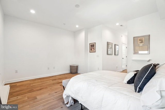 2237 N Hope St, Philadelphia, PA 19133 - bedroom with baseboards, recessed lighting, and light wood-type flooring