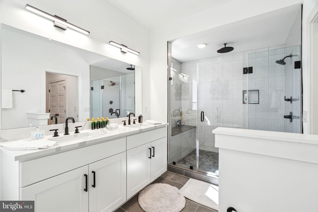 2237 N Hope St, Philadelphia, PA 19133 - full bathroom featuring double vanity, a shower stall, and a sink