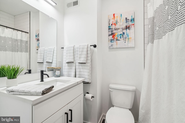 2237 N Hope St, Philadelphia, PA 19133 - full bathroom with toilet, vanity, a shower with shower curtain, and visible vents