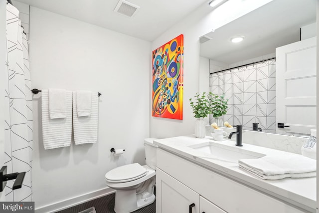 2237 N Hope St, Philadelphia, PA 19133 - bathroom featuring toilet, vanity, visible vents, and baseboards