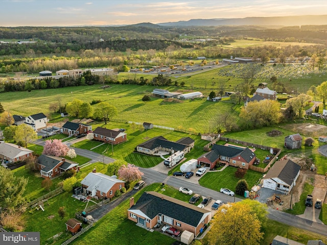 aerial view at dusk with a residential view