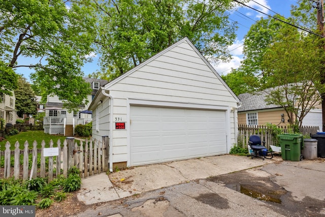 detached garage with fence