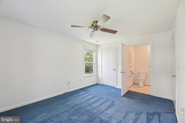 2715 Snowbird Ter Unit 4-28, Silver Spring, MD 20906 - unfurnished bedroom featuring carpet, baseboards, ensuite bath, ceiling fan, and a textured ceiling