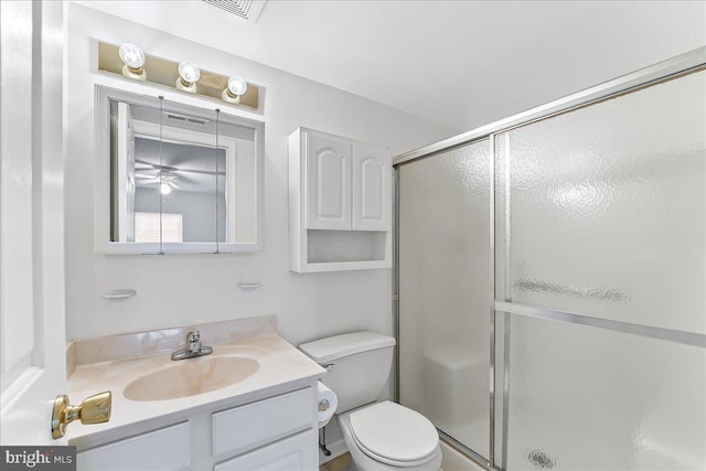 615 Brandon Rd, Norristown, PA 19403 - bathroom with vanity, toilet, a stall shower, and ceiling fan