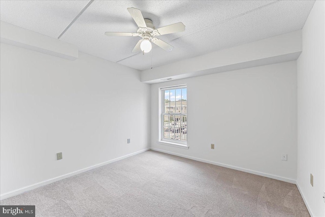 615 Brandon Rd, Norristown, PA 19403 - carpeted empty room with a ceiling fan, a textured ceiling, and baseboards