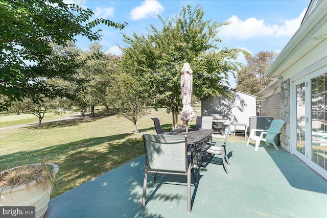 615 Brandon Rd, Norristown, PA 19403 - view of patio / terrace featuring outdoor dining area and central AC unit