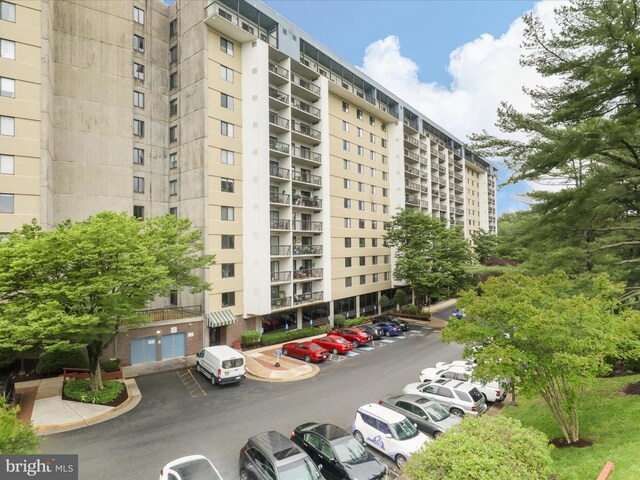 3800 Powell Ln Unit 828, Falls Church, VA 22041 - view of apartment building / complex featuring uncovered parking