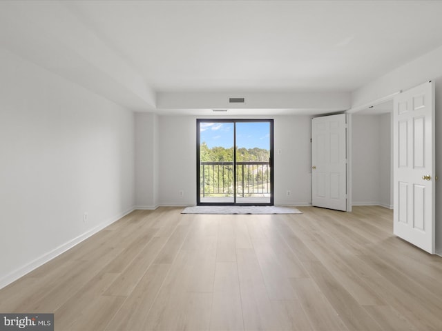 3800 Powell Ln Unit 828, Falls Church, VA 22041 - unfurnished room with light wood-type flooring and baseboards