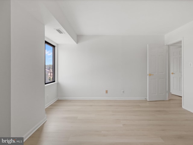 3800 Powell Ln Unit 828, Falls Church, VA 22041 - unfurnished room featuring light wood-type flooring and baseboards