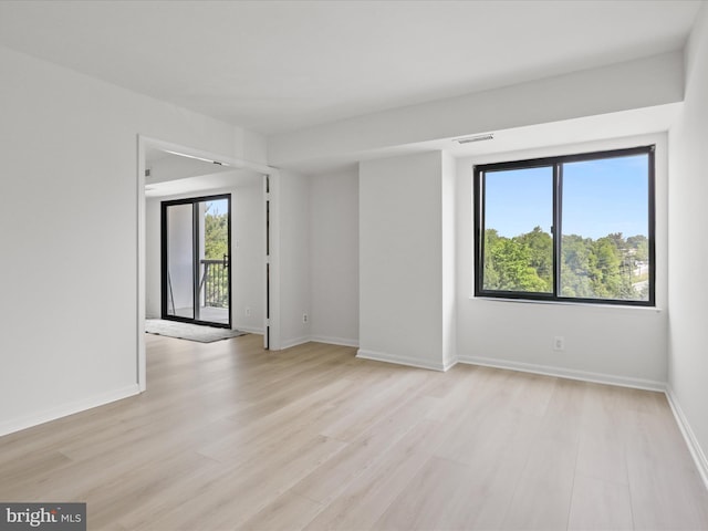 3800 Powell Ln Unit 828, Falls Church, VA 22041 - empty room featuring light wood finished floors and baseboards
