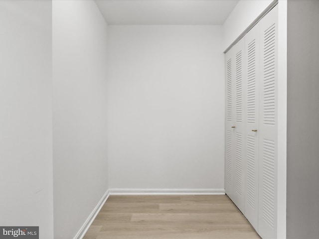 3800 Powell Ln Unit 828, Falls Church, VA 22041 - hallway featuring light wood-type flooring and baseboards