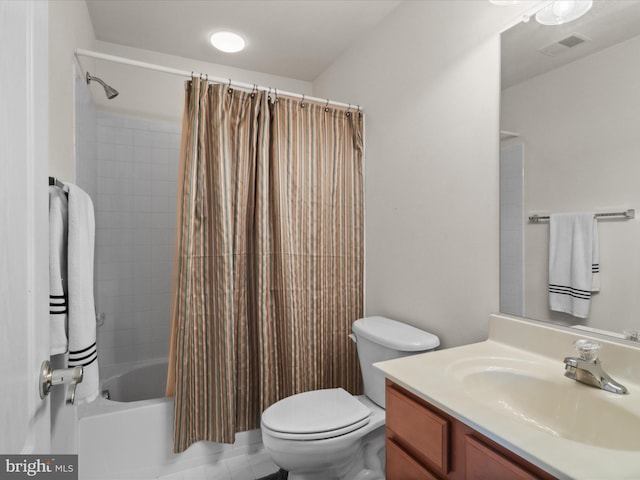 bathroom featuring visible vents, toilet, vanity, and shower / tub combo with curtain