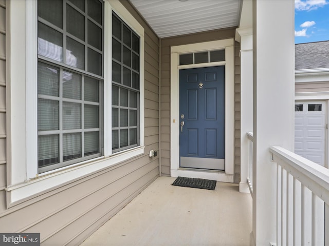 entrance to property with covered porch