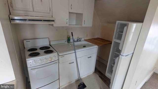 kitchen featuring a sink, light countertops, white appliances, and under cabinet range hood