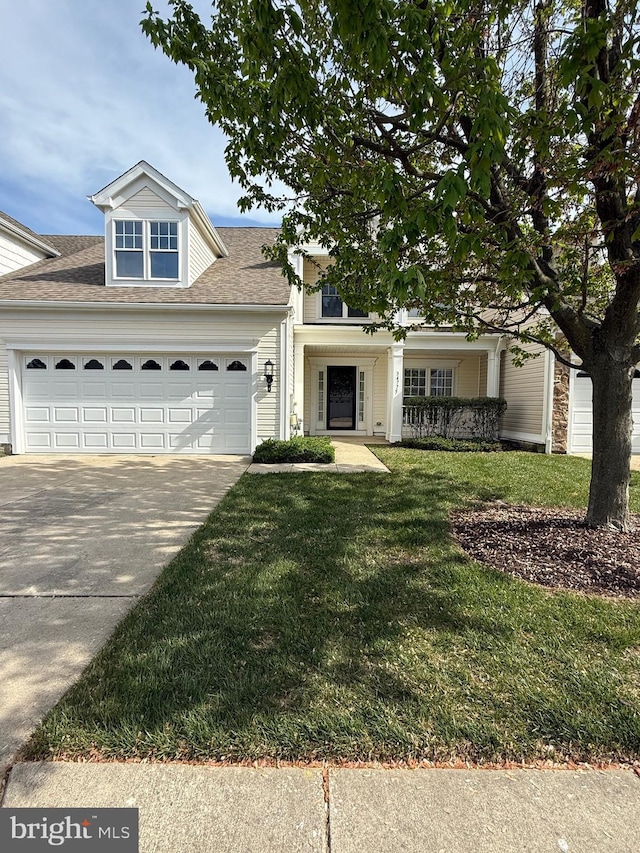 view of front facade featuring a shingled roof, a front lawn, a garage, concrete driveway, and covered porch