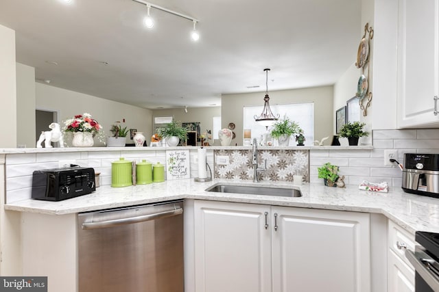 400 Symphony Cir Unit 351, Cockeysville, MD 21030 - kitchen featuring dishwasher, white cabinetry, light stone countertops, and a sink