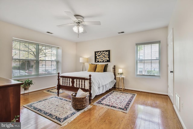 12105 Tullamore Ct Unit 101, Lutherville Timonium, MD 21093 - bedroom featuring baseboards, wood finished floors, and visible vents