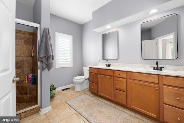 16260 Edgewater Dr, Milton, DE 19968 - full bathroom featuring a stall shower, baseboards, toilet, double vanity, and recessed lighting