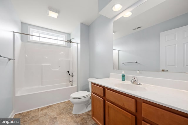 16260 Edgewater Dr, Milton, DE 19968 - full bathroom featuring toilet, vanity, bathing tub / shower combination, and baseboards