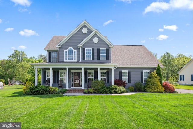 16260 Edgewater Dr, Milton, DE 19968 - colonial inspired home featuring a front lawn and covered porch