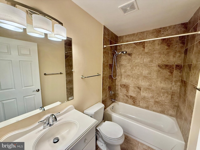 bathroom with shower / bath combination, visible vents, toilet, and vanity