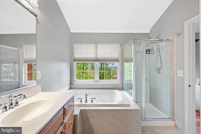 full bath featuring crown molding, a shower stall, a bath, and vanity