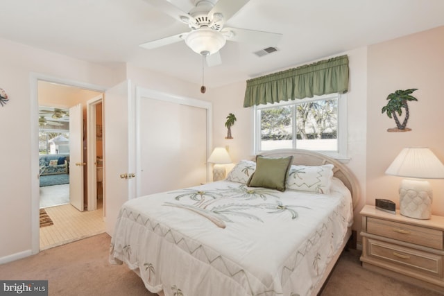 9007 Coastal Hwy, Ocean City, MD 21842 - carpeted bedroom with visible vents, a closet, and ceiling fan