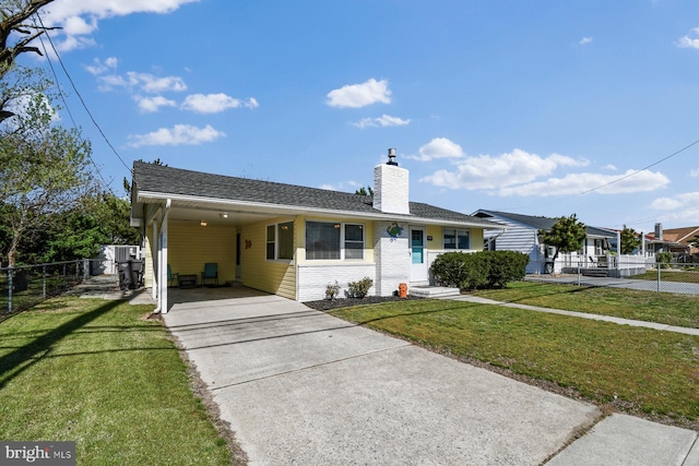 9007 Coastal Hwy, Ocean City, MD 21842 - ranch-style home featuring driveway, a front lawn, fence, and an attached carport