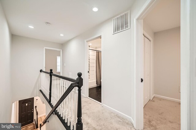 3014 Oakford Ave, Baltimore, MD 21215 - hall featuring an upstairs landing, light carpet, recessed lighting, and baseboards