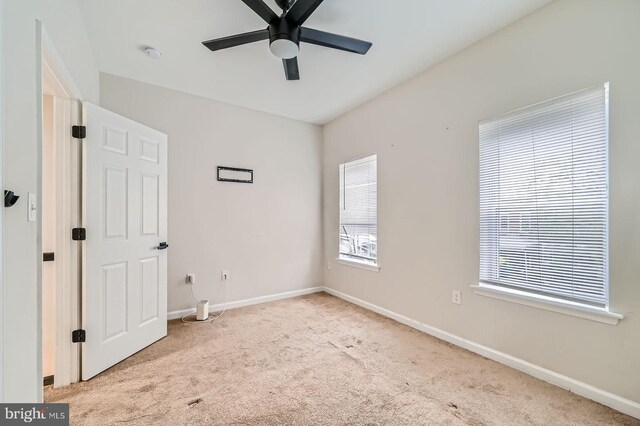 3014 Oakford Ave, Baltimore, MD 21215 - carpeted empty room featuring a ceiling fan and baseboards