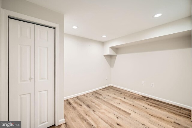 3014 Oakford Ave, Baltimore, MD 21215 - finished below grade area with baseboards, wood finished floors, and recessed lighting