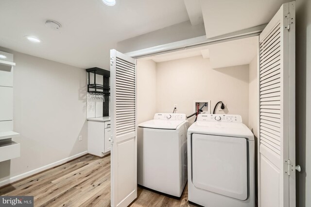 3014 Oakford Ave, Baltimore, MD 21215 - washroom with washer and dryer, light wood-type flooring, recessed lighting, and baseboards