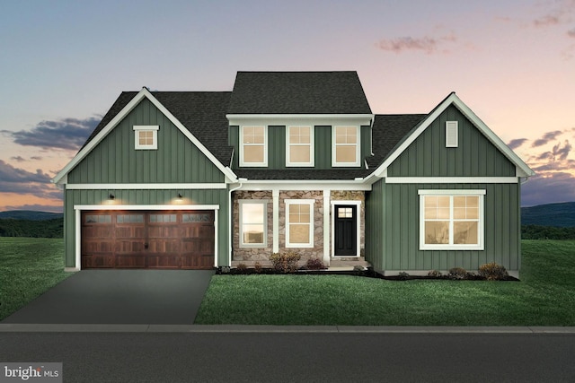 146 Wyndale Dr, Ephrata, PA 17522 - craftsman inspired home featuring board and batten siding, a front lawn, concrete driveway, and a garage