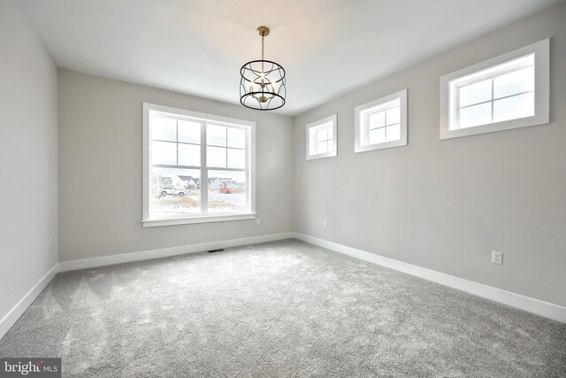 146 Wyndale Dr, Ephrata, PA 17522 - spare room with a chandelier, carpet, visible vents, and baseboards
