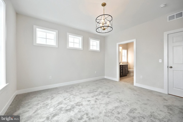 146 Wyndale Dr, Ephrata, PA 17522 - unfurnished bedroom featuring baseboards, visible vents, light colored carpet, and an inviting chandelier