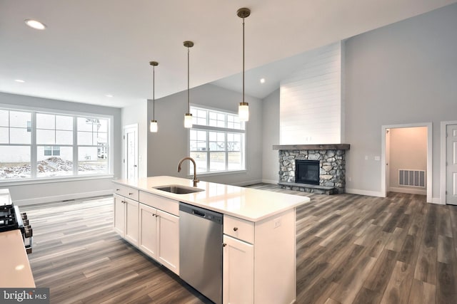 146 Wyndale Dr, Ephrata, PA 17522 - kitchen with stainless steel dishwasher, visible vents, a sink, and dark wood-type flooring
