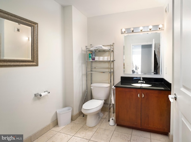 901 N Penn St Unit P506, Philadelphia, PA 19123 - half bath featuring tile patterned floors, toilet, vanity, and baseboards