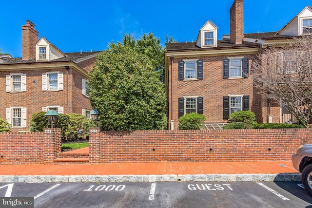 1000 Quinard Ct, Ambler, PA 19002 - multi unit property featuring a chimney, uncovered parking, and brick siding