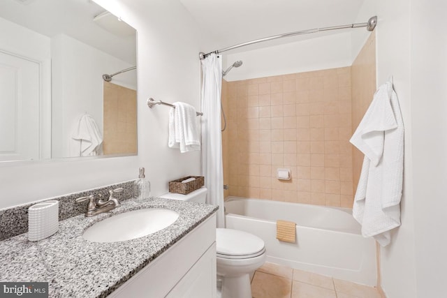full bathroom featuring tile patterned floors, vanity, shower / bathtub combination with curtain, and toilet