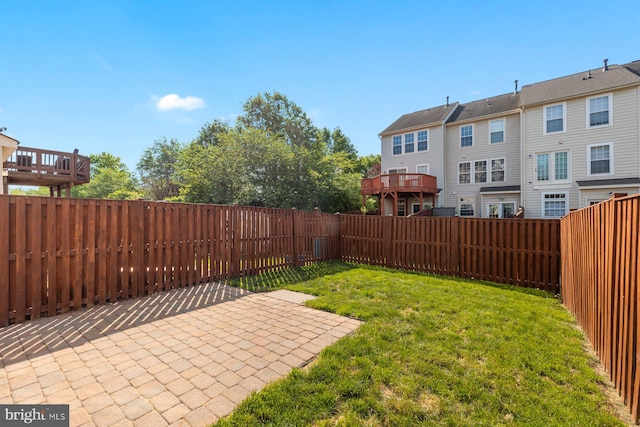 view of yard with a fenced backyard and a patio area