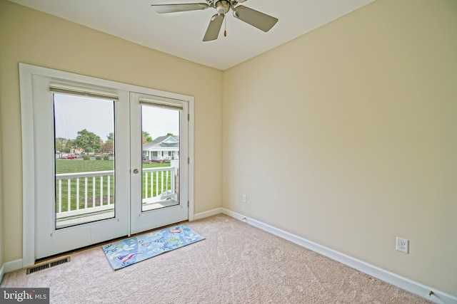 doorway featuring baseboards, carpet, french doors, and visible vents