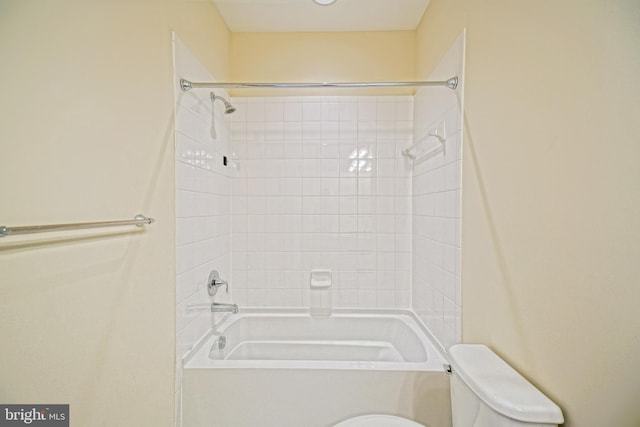 bathroom with toilet and shower / bath combination