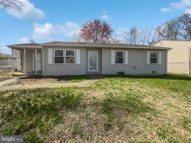 2115 Greenwood Dr, Waldorf, MD 20601 - rear view of house featuring fence and a lawn