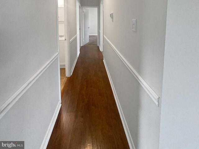 2115 Greenwood Dr, Waldorf, MD 20601 - hallway featuring wood finished floors and an upstairs landing