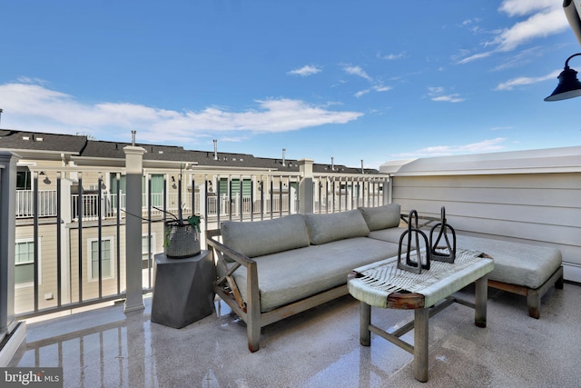 view of patio / terrace with a balcony and outdoor lounge area