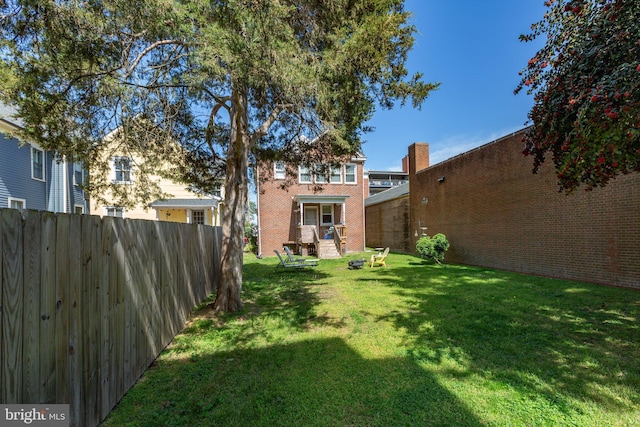 view of yard featuring fence