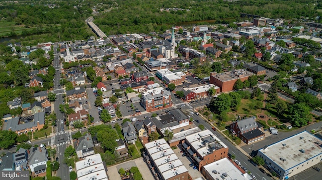 aerial view featuring a wooded view