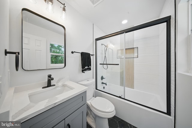 4403 Echo Ct, Woodbridge, VA 22193 - full bath with toilet, vanity, and enclosed tub / shower combo